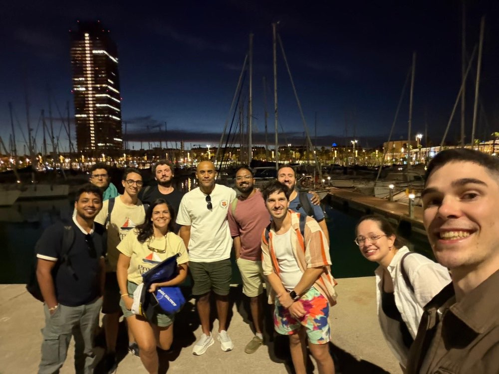 The full Edition 02 group at the marina after dark